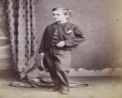 In the basement, one may chance upon a young boy, In the basement, one may chance upon a young boy, who might initiate a brief interaction. On taking a closer look, one may notice that the boy is in a